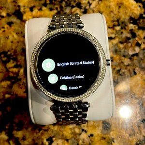 Michael Kors smart watch “Darci” w/ diamond bezels on watch face w/ Silver band